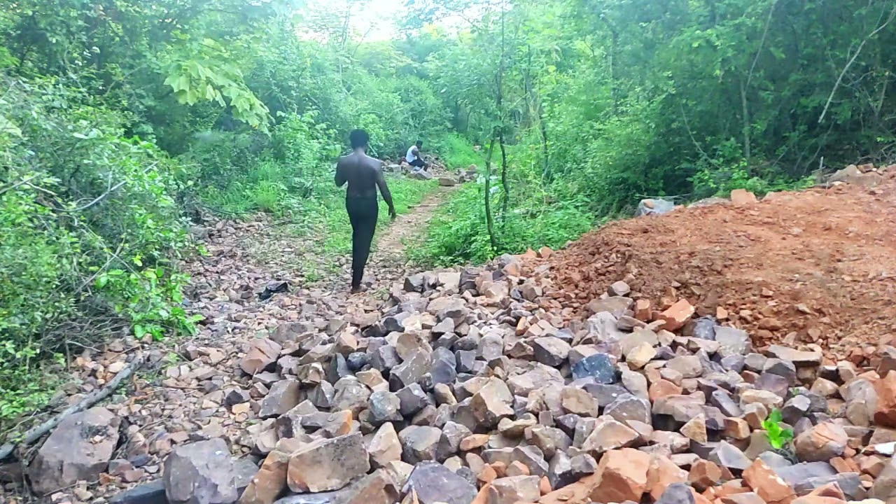 Rock being thrown in and the pit filling up.