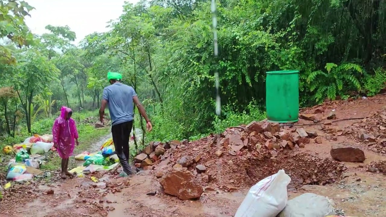 Sandbags carried in on a rainy day for the next day's concrete.
