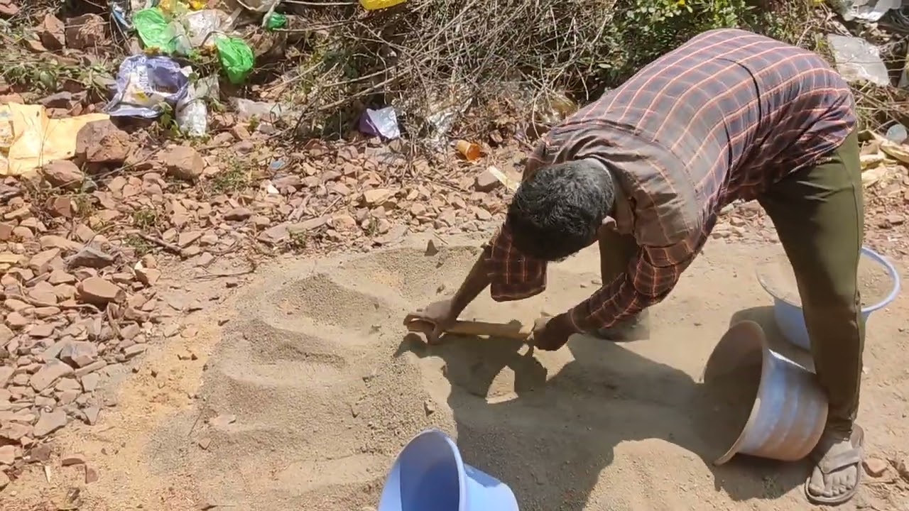 Cement being mixed at the temple for the floor.